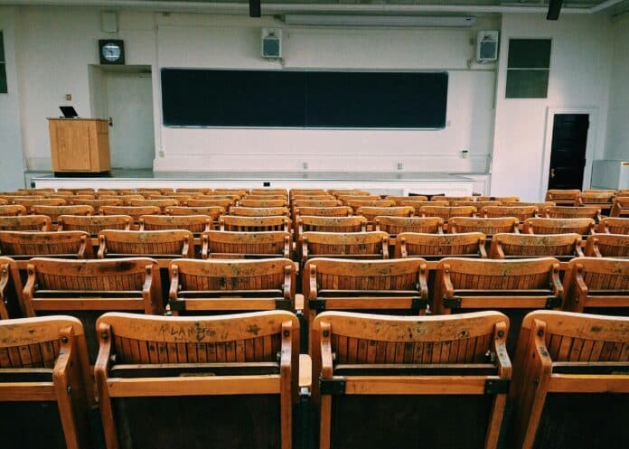 Brown and Black Wooden Chairs Inside Room By Pixabay