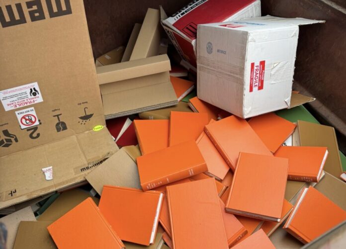download (69) Wichita State's Ablah Library has been discarding books, journals and other material into a dumpster on campus.