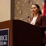 Democratic Rep. Sharice Davids speaks at a convention center in Overland Park, Kansas, on election night in November 2024.