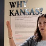 Sarah Bell, director of the Kansas Museum of History, talks about the renovated gallery space during a Nov. 5, 2025, interview. The gallery asks visitors: What is Kansas? What was Kansas? and Why Kansas? (Photo by Sherman Smith/Kansas Reflector)