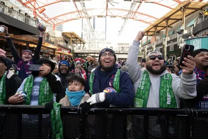 download (39) Young fan Eddy Reyes, from left, his father Juan Reyes, and Enrique Reyes cheer as the results begin to come in. In the countdown to the FIFA World Cup 26, a region-wide watch party for the FIFA World Cup 26 Final Draw drew a crowd of Friday morning to KC Live! in the Power & Light District.
