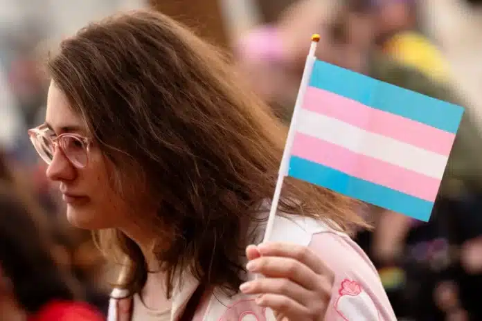 Protests have ramped up after a Kansas law that prevents transgender people from changing their birth certificates and driver's licenses to reflect their gender identities went into effect.