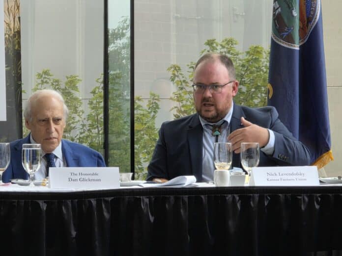 Glickman-levendofsky-20250827_131619-2048x1536 Nick Levendofsky (right), executive director of the Kansas Farmers Union, is concerned the failure to move a farm bill out of the Senate Agriculture Committee on Aug. 6, 2026, means the bill won't happen this year. He's shown here speaking about agriculture with former U.S. Agriculture Secretary Dan Glickman during a U.S. Global Leadership Coalition meeting in 2025, in Overland Park. (Photo by Morgan Chilson/Kansas Reflector)