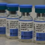 Vials of measles, mumps and rubella vaccine are displayed on a counter at a Walgreens Pharmacy on Jan. 26, 2015 in Mill Valley, California. (Illustration by Justin Sullivan/Getty Images)